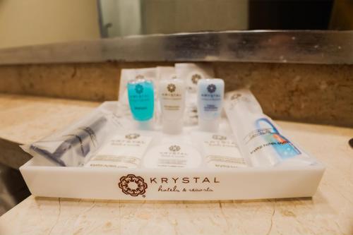 a box of hygiene products sitting on a counter at Krystal Monterrey in Monterrey