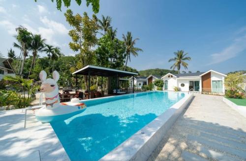 La alberca dentro o cerca de Tropical Oasis Aoyon Beach House