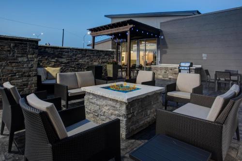 a patio with chairs and a table with a fire pit at Residence Inn By Marriott Wichita Falls in Wichita Falls