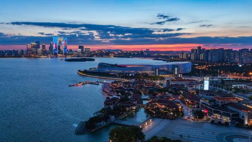 an aerial view of a city at night at InterContinental Suzhou Hotel by IHG in Suzhou