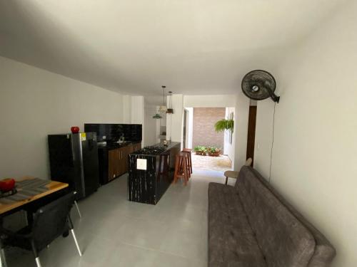 Μια τηλεόραση ή/και κέντρο ψυχαγωγίας στο Apartamento Villa Mary-Coveñas