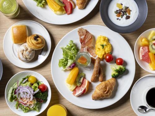 a group of plates of food on a table at Novotel Nara in Nara
