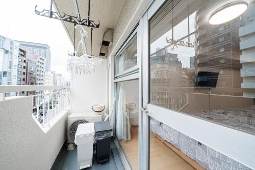 a balcony with a view of a city at TOKYO ICHIBAN SHINJUKU in Tokyo