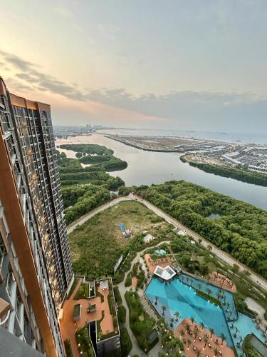 an aerial view of a resort and a lake at Gold Coast Apartment PIK Luxury Sea View by stay with E in Jakarta