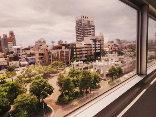 a view of a city from a window at D D Hotel in Tainan