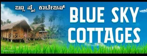 a sign that reads blue sky cures cities at Blue Sky Cottages Hampi in Hampi