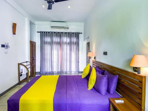 Postel nebo postele na pokoji v ubytování Tropical Villa - Weligama