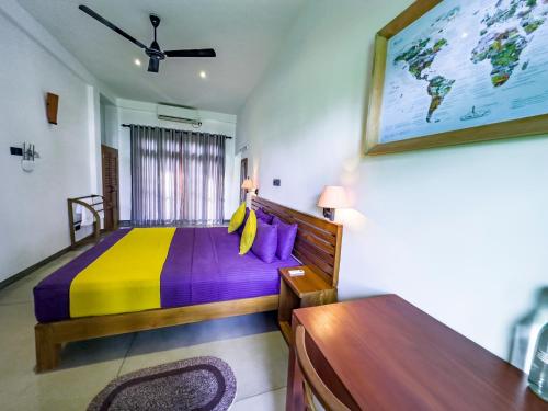 Postel nebo postele na pokoji v ubytování Tropical Villa - Weligama