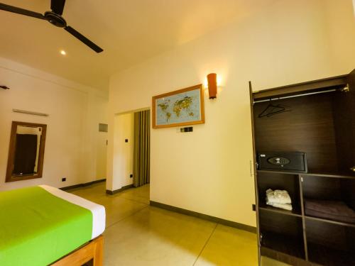 Postel nebo postele na pokoji v ubytování Tropical Villa - Weligama
