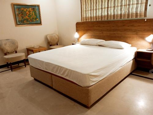 Postel nebo postele na pokoji v ubytování Morgh Resort Villas