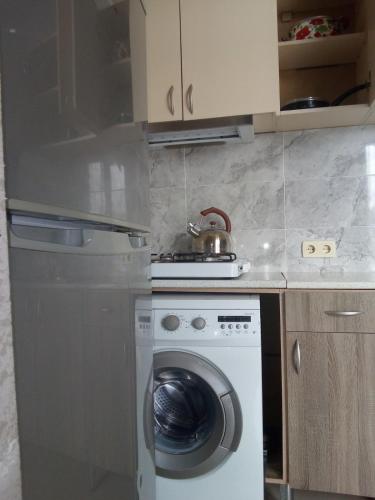 Kuchyň nebo kuchyňský kout v ubytování Gldani-house
