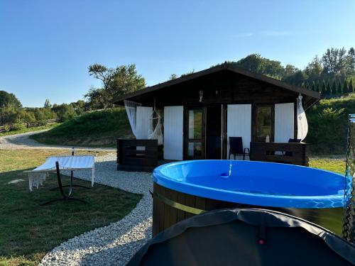 Πισίνα στο ή κοντά στο Bieszczadzka Osada Saunowisko w cenie jacuzzi na wyłączność, sauna basen