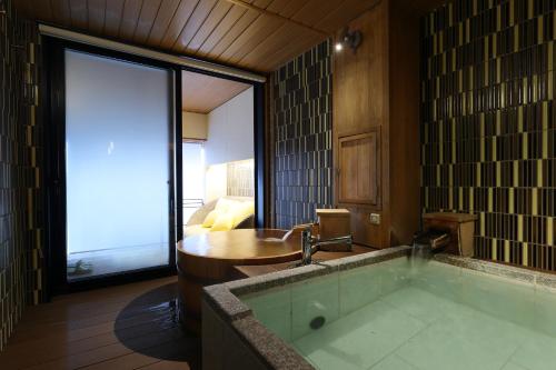 ภาพในคลังภาพของ Yorokobinoyado Takamatsu ในคุซาสึ