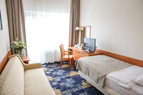 Hotel Wodnikにあるベッド