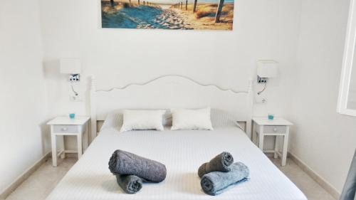 Ένα ή περισσότερα κρεβάτια σε δωμάτιο στο Apart. Cala'n forcat,4-6pax. Ciutadella de Menorca