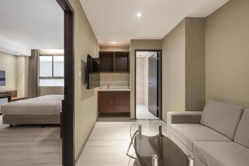 Cama o camas de una habitación en 河堤漫旅-自立館River inn Zili