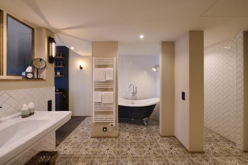 Koupelna v ubytování PAPA RHEIN - Hotel & Spa