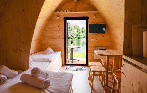 Postel nebo postele na pokoji v ubytování Appartementanlage am Arnumer See