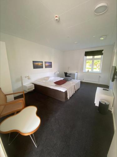 Postel nebo postele na pokoji v ubytování Borre Knob Fjordhotel