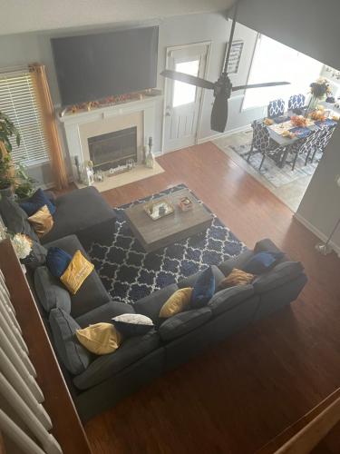 an aerial view of a living room with a couch at House on the Hill in Columbia