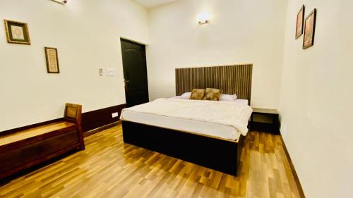 Katil atau katil-katil dalam bilik di Spring Gardens and Farmstay