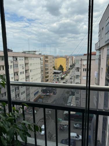 a view of a city street from a window at Penthouse Exclusive in Pristina