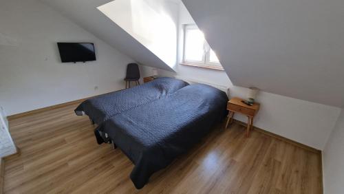 Postel nebo postele na pokoji v ubytování R&B Apartamenty