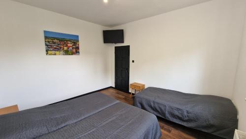 Postel nebo postele na pokoji v ubytování R&B Apartamenty