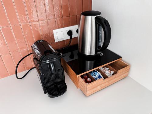 Business Accommodation 'Flow Living' Nomadにあるコーヒーまたはお茶