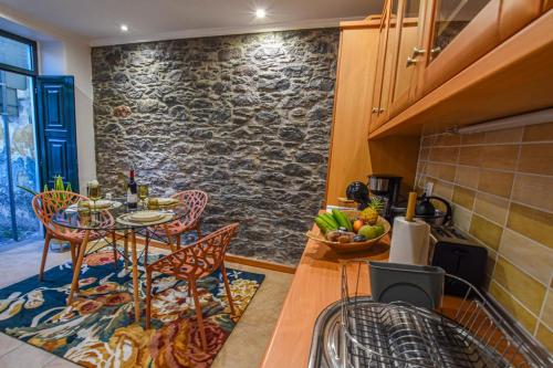 Køkken eller tekøkken på Casa Laurinda Funchal