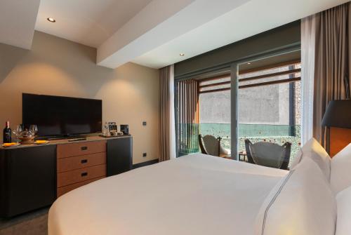 Lujo Hotel Bodrumにあるベッド