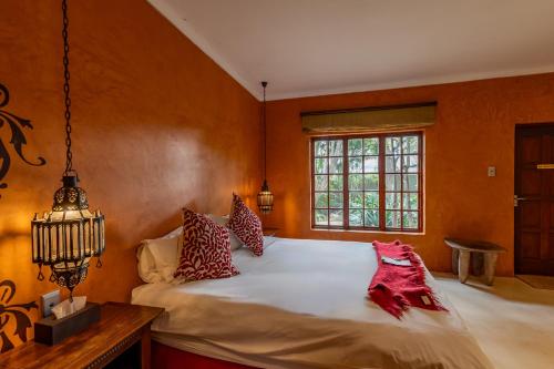 Katil atau katil-katil dalam bilik di Singa Lodge - Lion Roars Hotels & Lodges