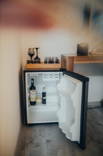 Fotografie z fotogalerie ubytování Pensiunea Casa Iulia A-Frame v destinaci Martinie