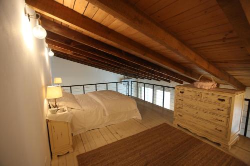 Säng eller sängar i ett rum på Open Space Bergamo Centro