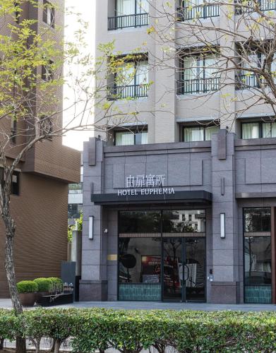 a building with a sign that reads hotel equilibrium at Hotel Euphemia in Taichung