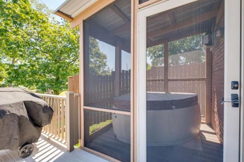 a gazebo with a hot tub on a deck at 4 Mi to German Village Studio with Hot Tub! in Millersburg
