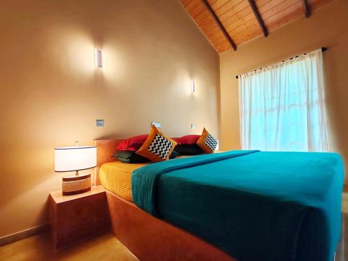 Postel nebo postele na pokoji v ubytování Art Yala Boutique Resort