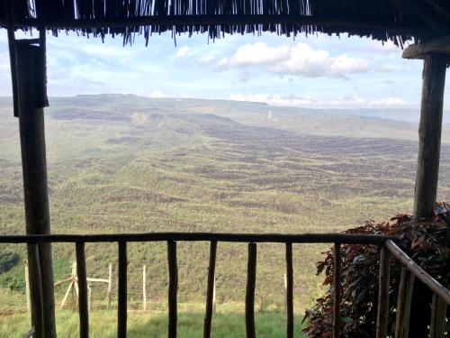 a view from the porch of a mountain house at Maili Saba Camp in Nakuru