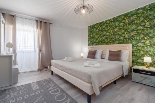 Ένα ή περισσότερα κρεβάτια σε δωμάτιο στο Apartment Richard