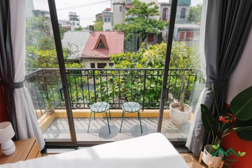 E Village Hotel Hanoiにあるバルコニーまたはテラス