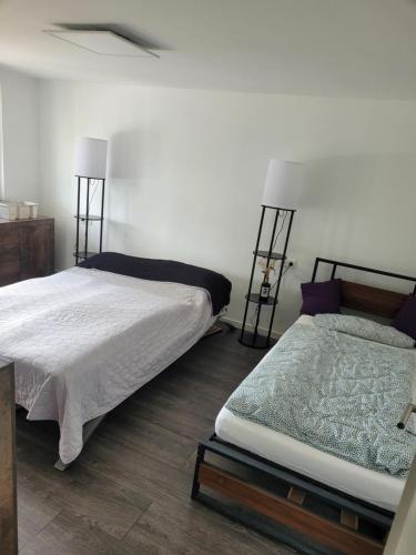 Postel nebo postele na pokoji v ubytování Ferienwohnung Marrazzo