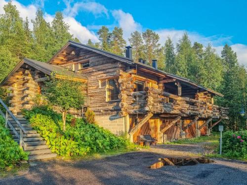 a log cabin with a bunch of bananas in front of it at Holiday Home Sallanhelmi b1 by Interhome in Salla