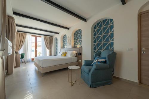 Ένα ή περισσότερα κρεβάτια σε δωμάτιο στο Boutique Hotel Palazzo Donna Iulia