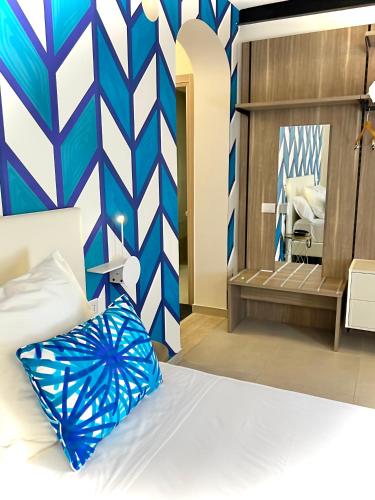 Ένα ή περισσότερα κρεβάτια σε δωμάτιο στο Boutique Hotel Palazzo Donna Iulia