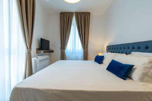 Ένα ή περισσότερα κρεβάτια σε δωμάτιο στο Boutique Hotel Palazzo Donna Iulia