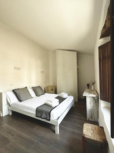 Ένα ή περισσότερα κρεβάτια σε δωμάτιο στο Affittacamere Casa del Pane