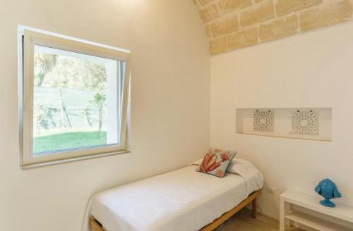 Ένα ή περισσότερα κρεβάτια σε δωμάτιο στο Emerald Suites - Villa Emerald