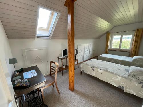 Voodi või voodid majutusasutuse B&B Domaine En Trembley toas
