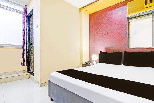 Postel nebo postele na pokoji v ubytování Hotel new shree niwas