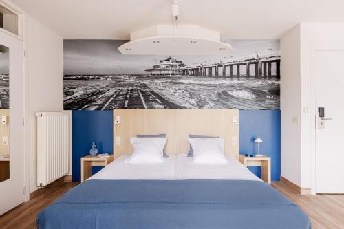 Postel nebo postele na pokoji v ubytování Enjoy Hotel Noordzee - Paradisio By WP Hotels